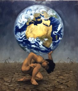 A boy holds the earth on his back